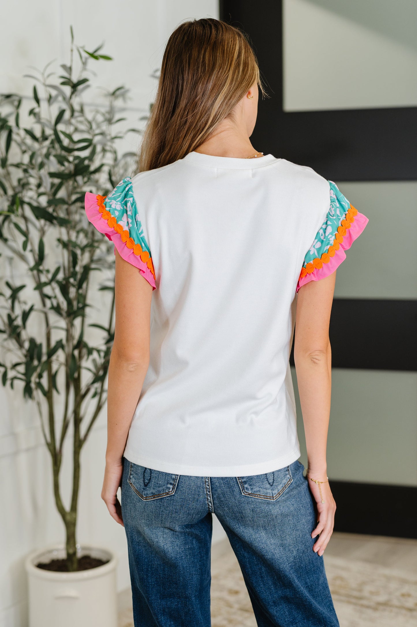 Petals & Poise Floral Flutter Sleeve Top in White
